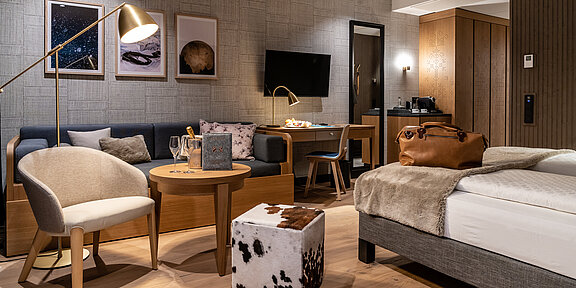 Alpine modern furnished Unique Suite with cosy reading corner in 4-star Löwen Hotel in Vorarlberg